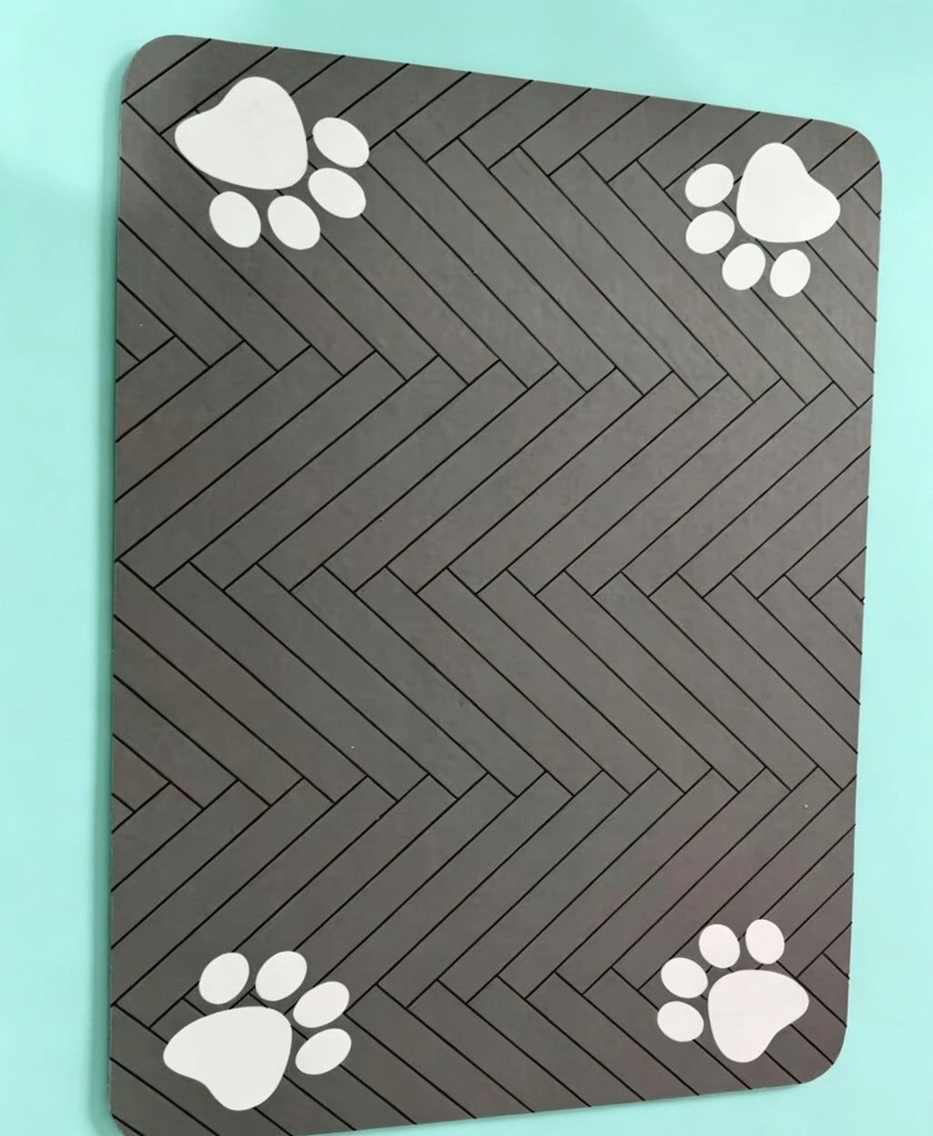 Alfombrilla absorbente para comedero de mascotas