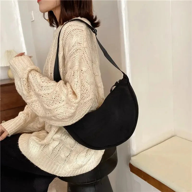 Riñonera de media luna unisex