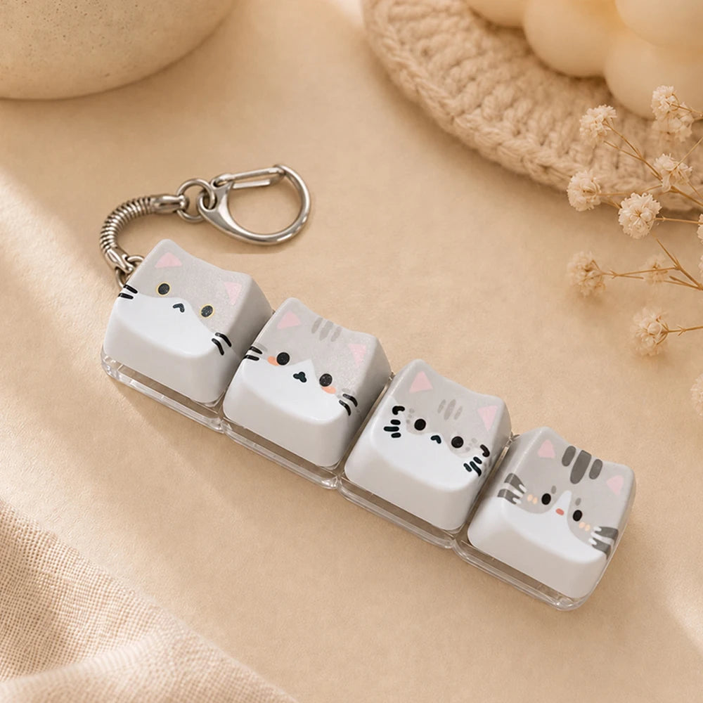 Llavero antiestrés de teclas con gatitos