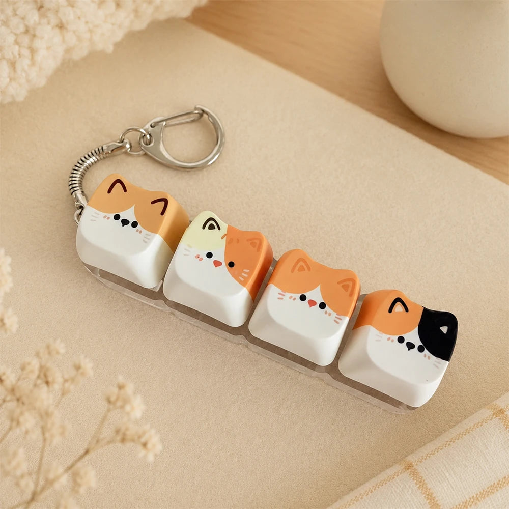 Llavero antiestrés de teclas con gatitos