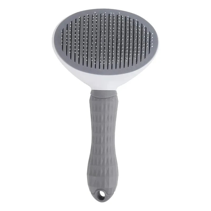 Cepillo autolimpiable para perros y gatos